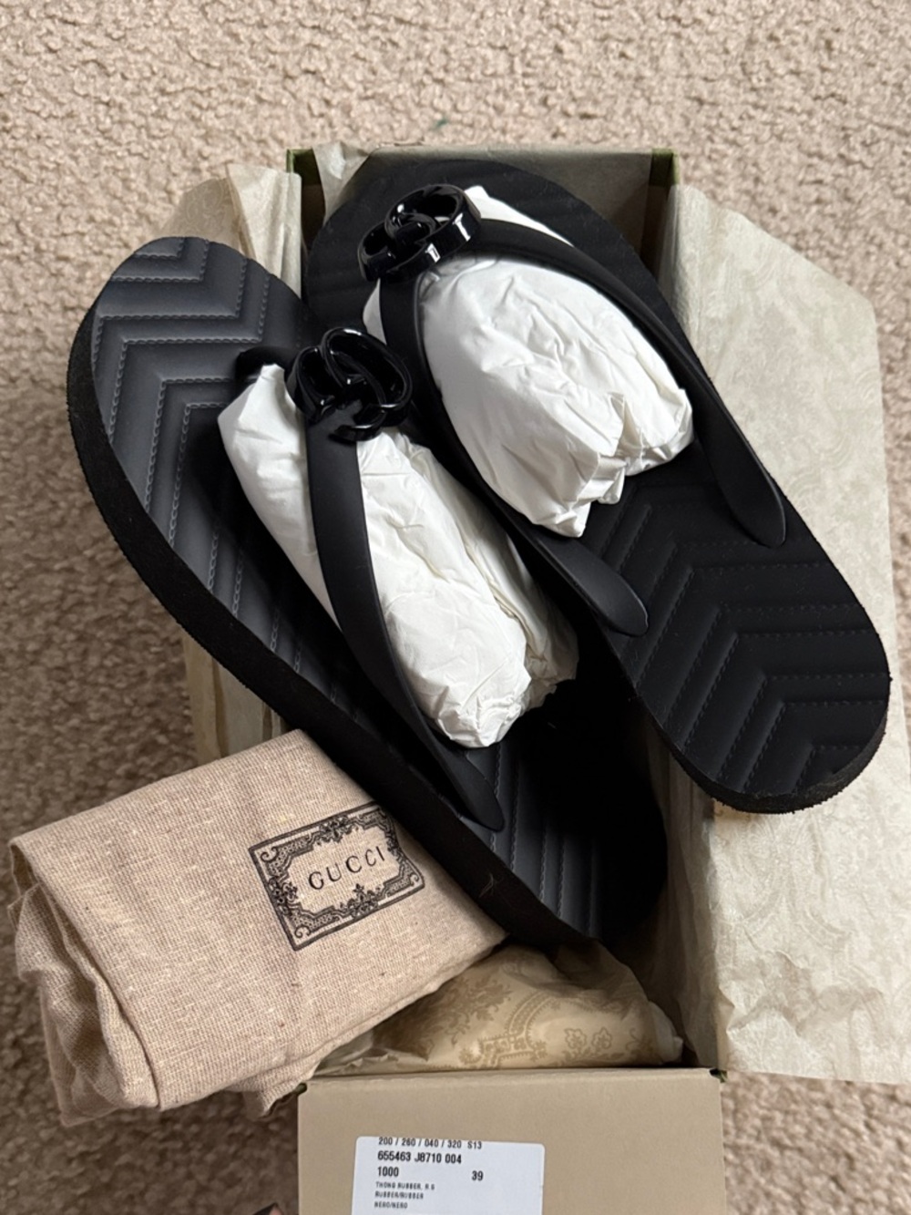 Gucci Black Chevron Rubber Flip Flops with Logo Accent